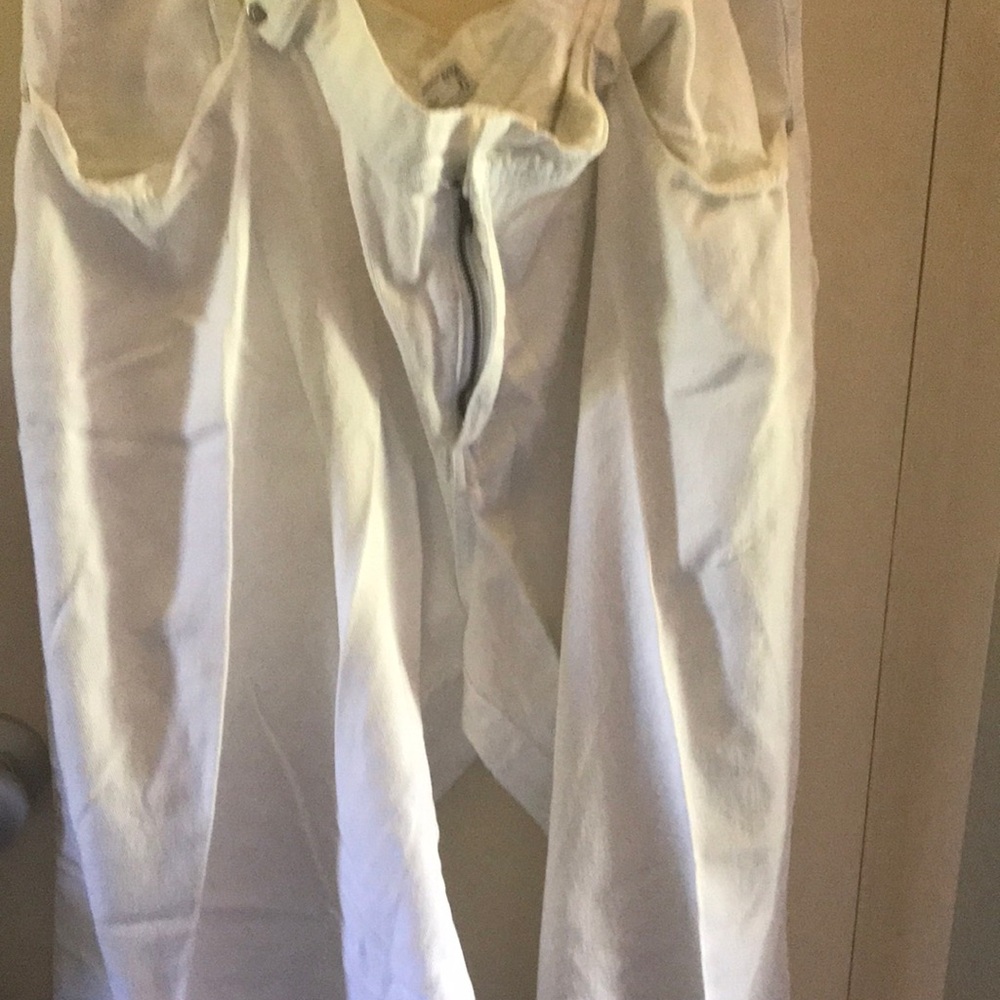 White U-51..sz 24..button missing ..slight piling in thigh area..no holes GUC..